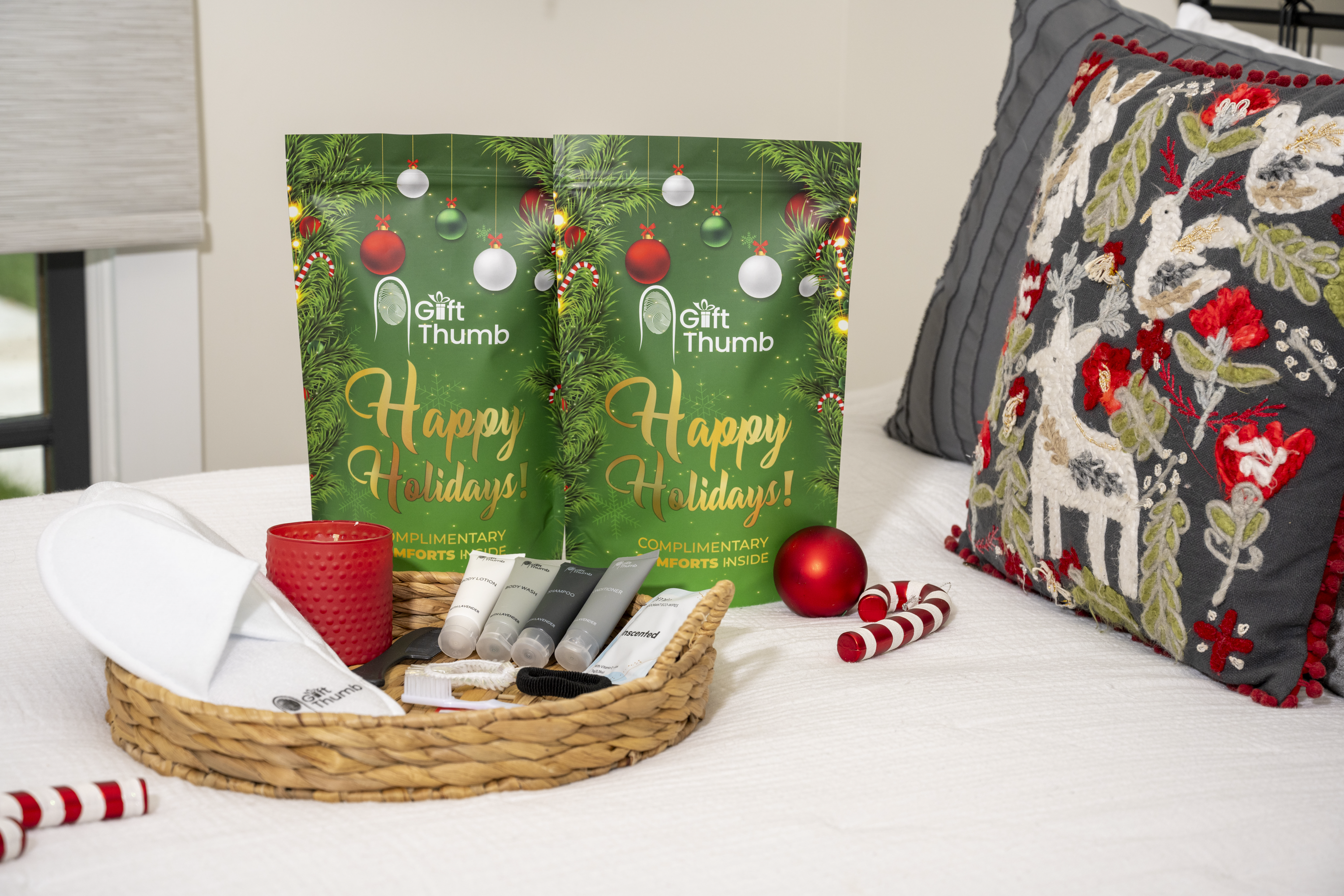 Holiday-themed guest essentials pouch with slippers and toiletries