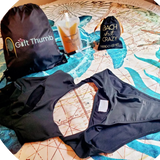 Beach Babe set with monokini swimsuit, beach mat, and drink pouches