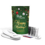 Holiday-themed guest essentials pouch with slippers and toiletries